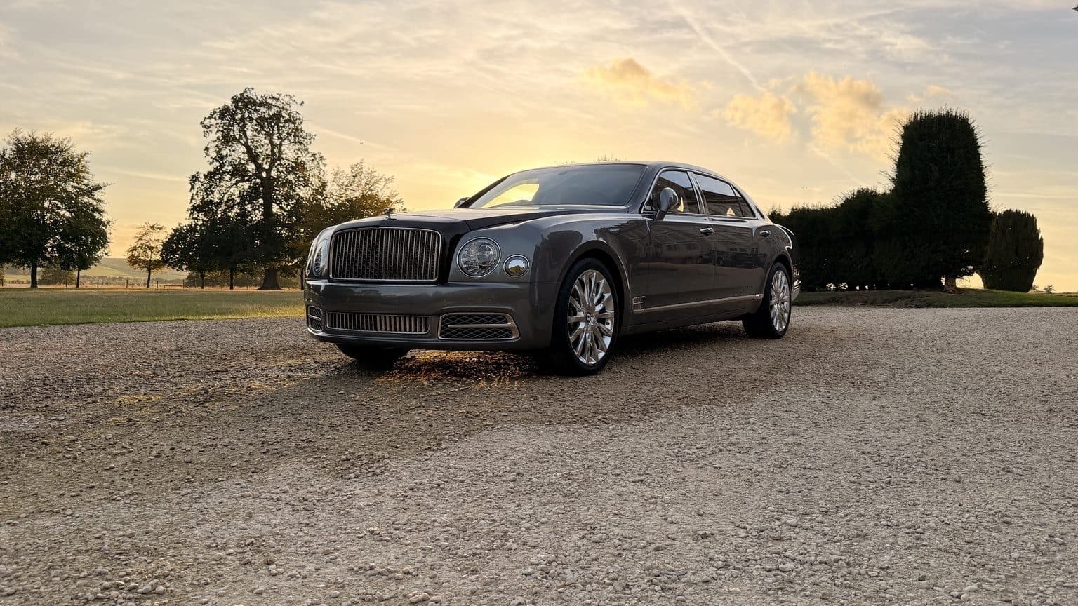 Bentley Mulsanne on a gravel drive at sunset